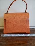 Orange leather bag