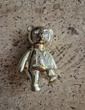 Teddy golden brooch
