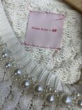 White pearl sweater