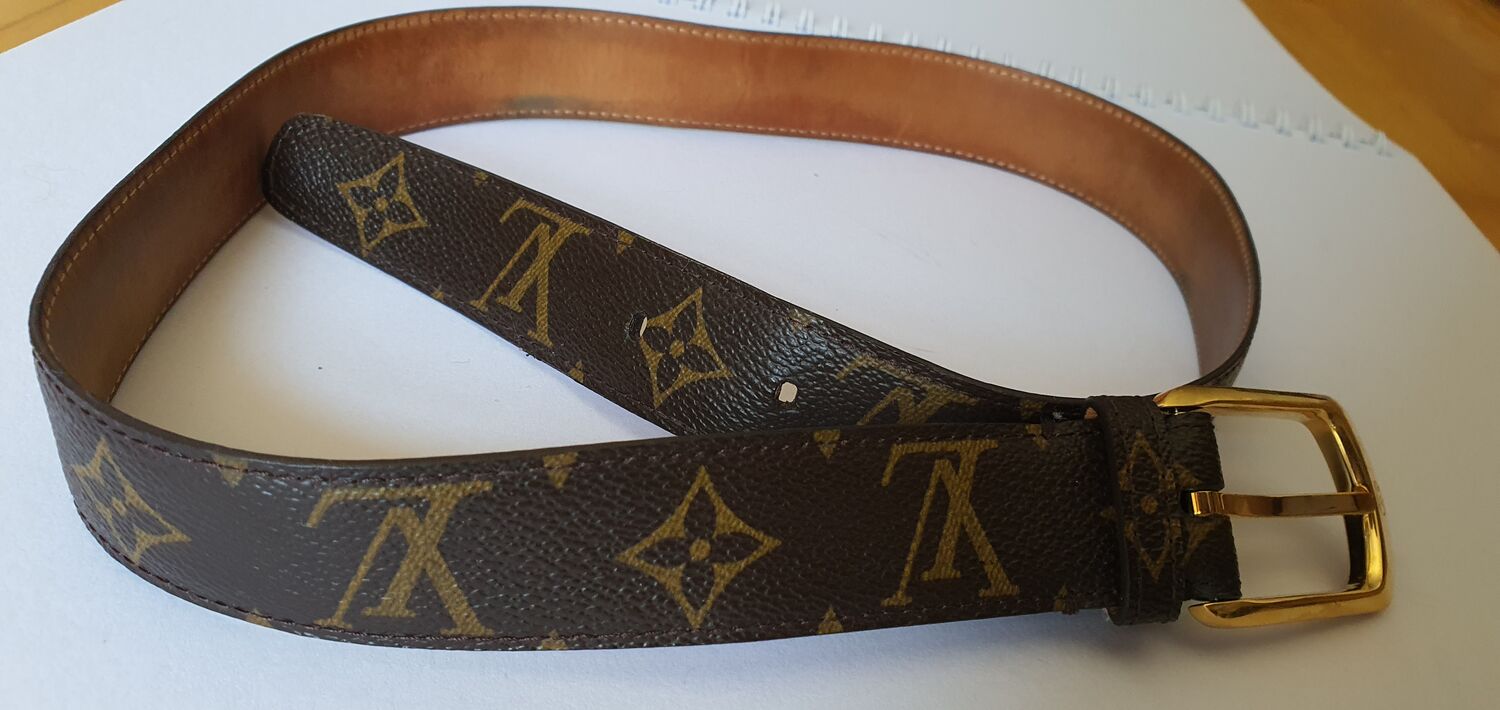 Louis Vuitton belt. Black and Grey with gold emblem.