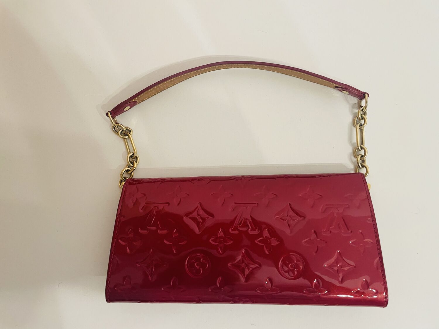 Patent Clutch bag Louis Vuitton, buy pre-owned at 600 EUR