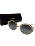 Round golden sunglasses