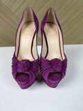 Purple platform pumps
