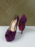 Purple platform pumps