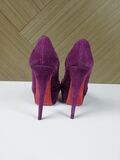 Purple platform pumps