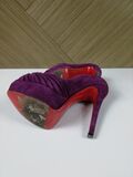 Purple platform pumps
