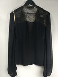 Sheer black blouse