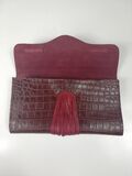 Red leather clutch