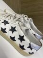 Star printed leather sneakers
