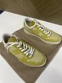 Green leather sneakers