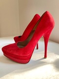 Red suede pumps