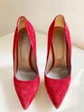 Red suede pumps