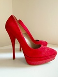 Red suede pumps