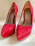 Red suede pumps