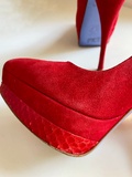 Red suede pumps