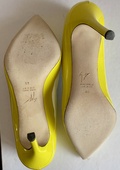 Yellow patent leather stilettos