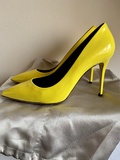 Yellow patent leather stilettos