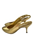 Gold leather slingback shoes