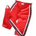 Red conic pants with side pinstripe