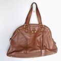 Leather bag with golden lock