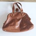 Leather bag with golden lock