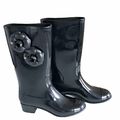 Knee high rain boots